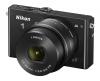 Nikon 1 J4 Digital Camera with 1 NIKKOR 10-30mm f/3.5-5.6 PD Zoom Lens (Black)